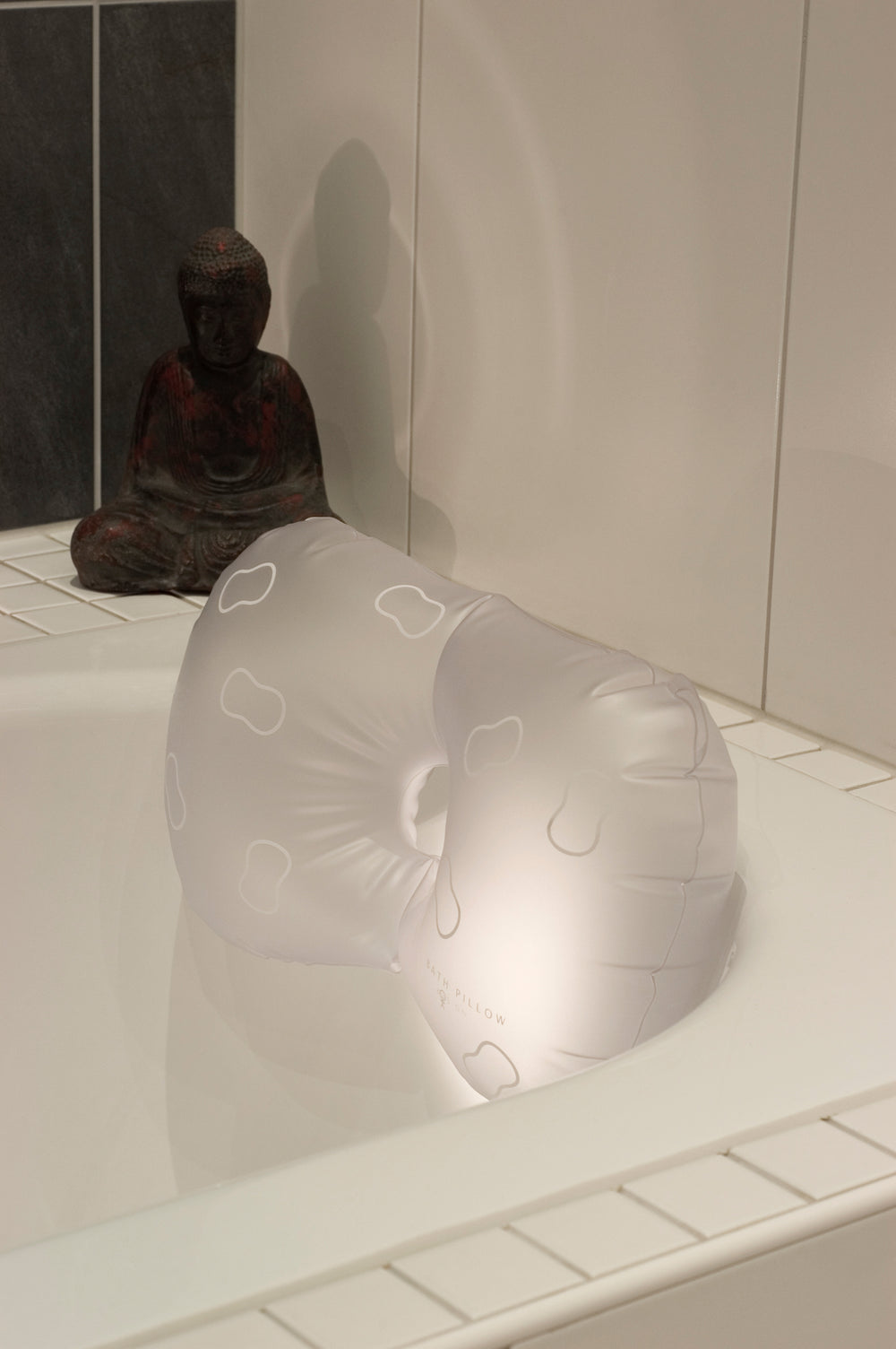 Inflatable Bathtub Pillow 
Frost White. Suction cup fastener
Made from recycled vinyl (BPA-free)