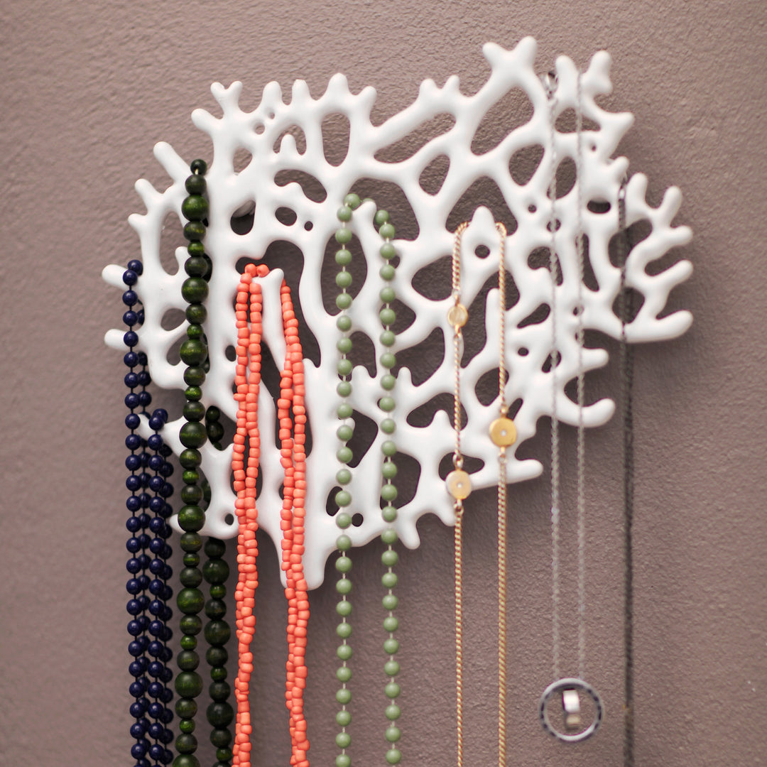 Wall mount Coral Jewelry Organizer
White. Lacquered cast zinc